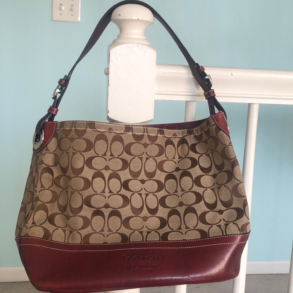 Coach purse in brown/tan with burgundy accents. Gently used